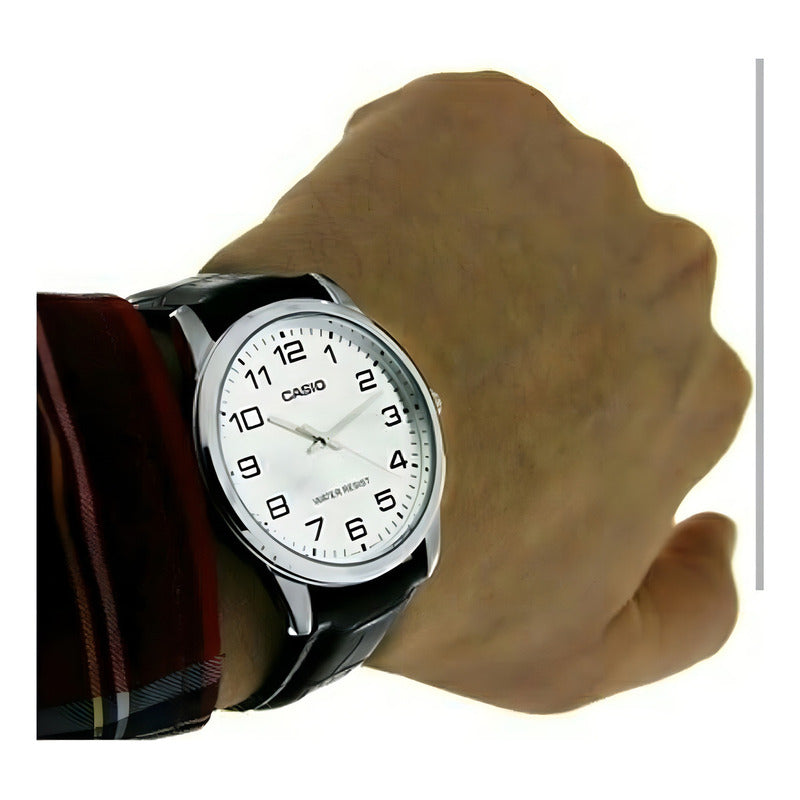 Reloj Pulsera Casio Mtp-v001l-7bu Con Correa De Cuero Color Negro - Fondo Plateado